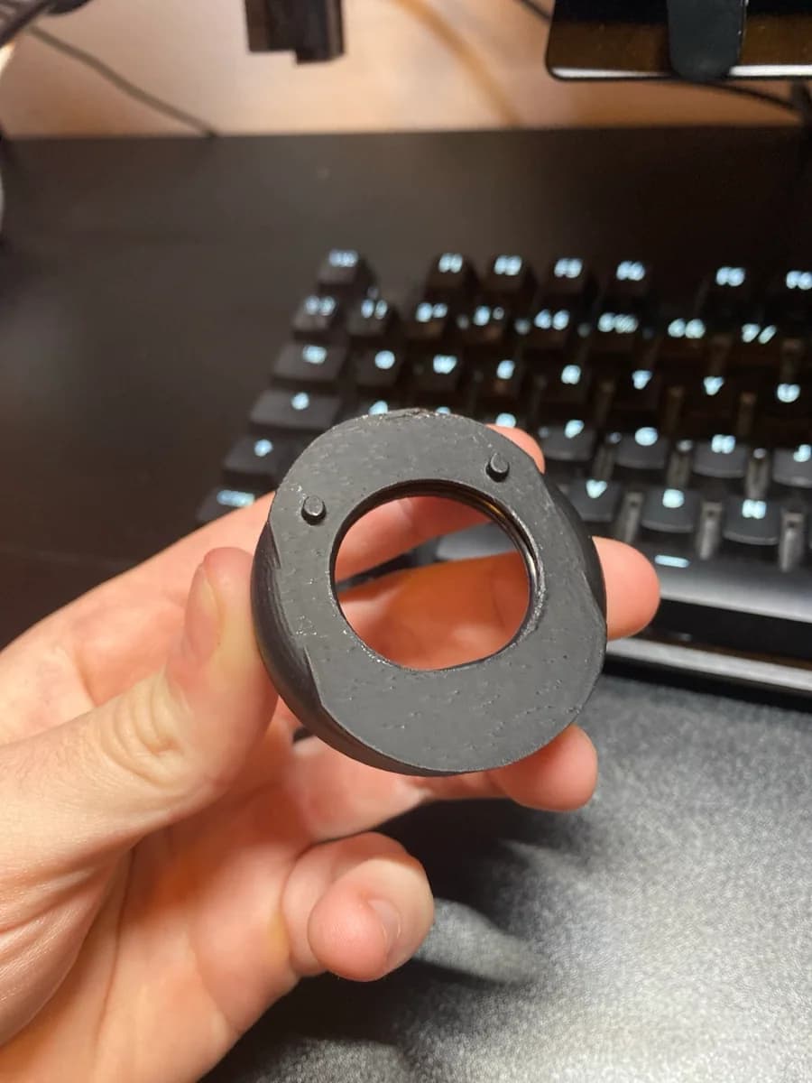 Adaptador circular negro impreso en 3D